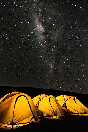 tent under stars night sky